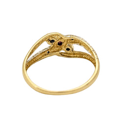 Ring in white gold, yellow gold, rubies, and diamonds