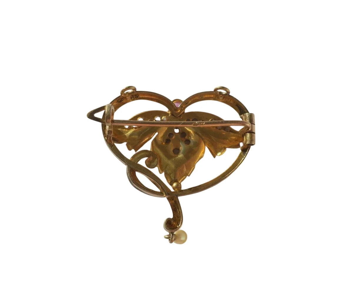 Art Nouveau Brooch Pendant with Rubies, Diamonds, and a Fine Pearl in 18-carat Rose Gold and Platinum
