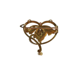 Art Nouveau Brooch Pendant with Rubies, Diamonds, and a Fine Pearl in 18-carat Rose Gold and Platinum