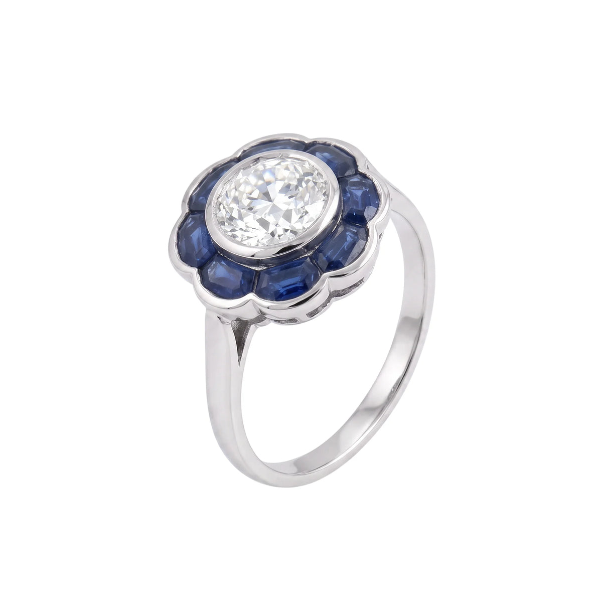 Entourage Ring in platinum, sapphires, and diamonds