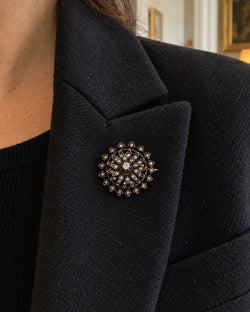 Brooch made of yellow gold, silver, and diamonds