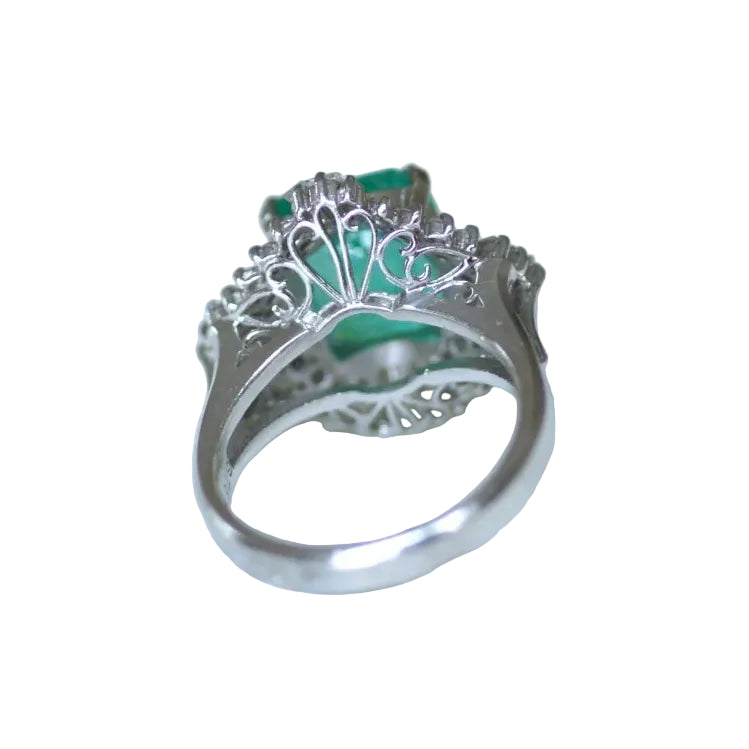 Entourage Ring in Platinum, Emerald, and Diamonds