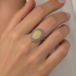 Entourage Ring in white gold, Opal, and Diamonds