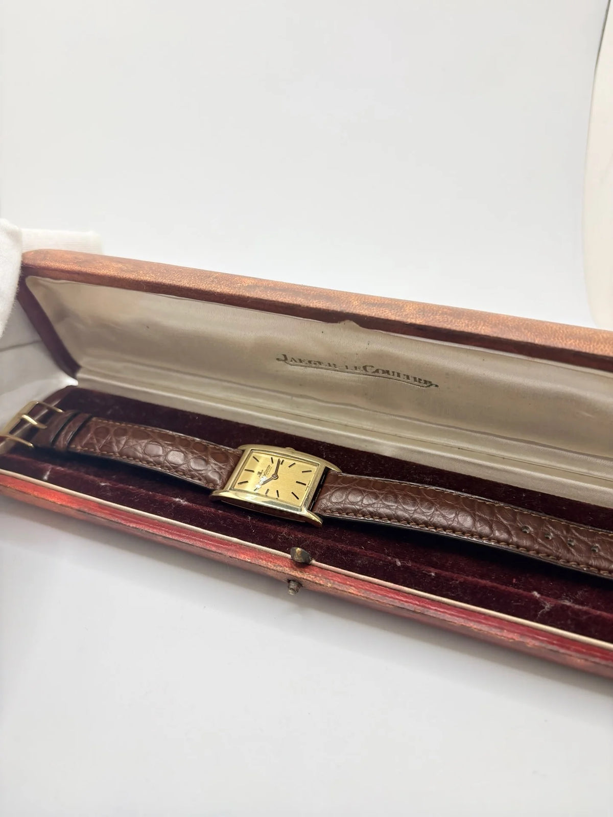 JAEGER-LECOULTRE "Tank Vintage" Watch in yellow gold, stainless steel, and leather