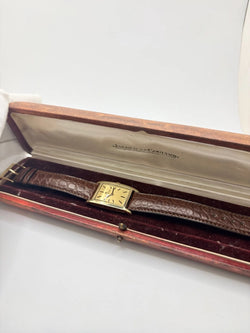 JAEGER-LECOULTRE "Tank Vintage" Watch in yellow gold, stainless steel, and leather