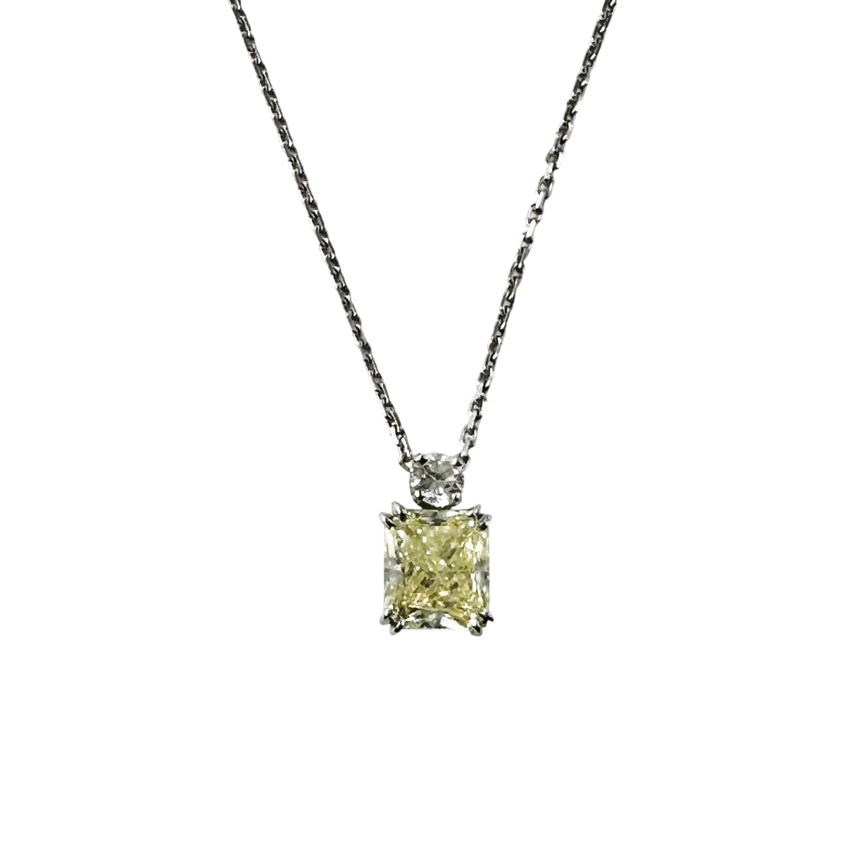 White Gold Necklace with a Pendant Featuring a Fancy Yellow Diamond and a Diamond
