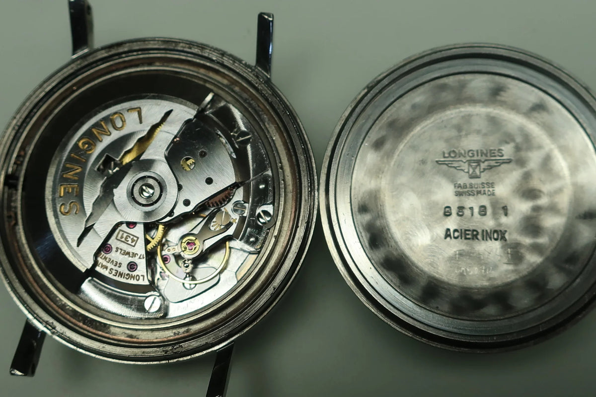 Montre LONGINES Ultra-Chron en acier et cuir