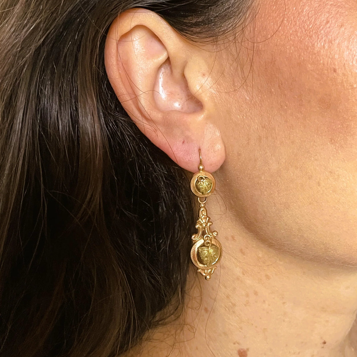 Vintage drop earrings in rose gold and green gold with a vine leaf motif