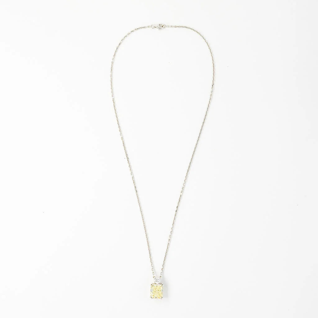 White Gold Necklace with a Pendant Featuring a Fancy Yellow Diamond and a Diamond