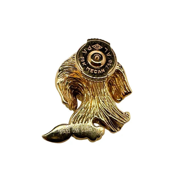 VAN CLEEF & ARPELS brooch in yellow gold, Onyx, and emeralds
