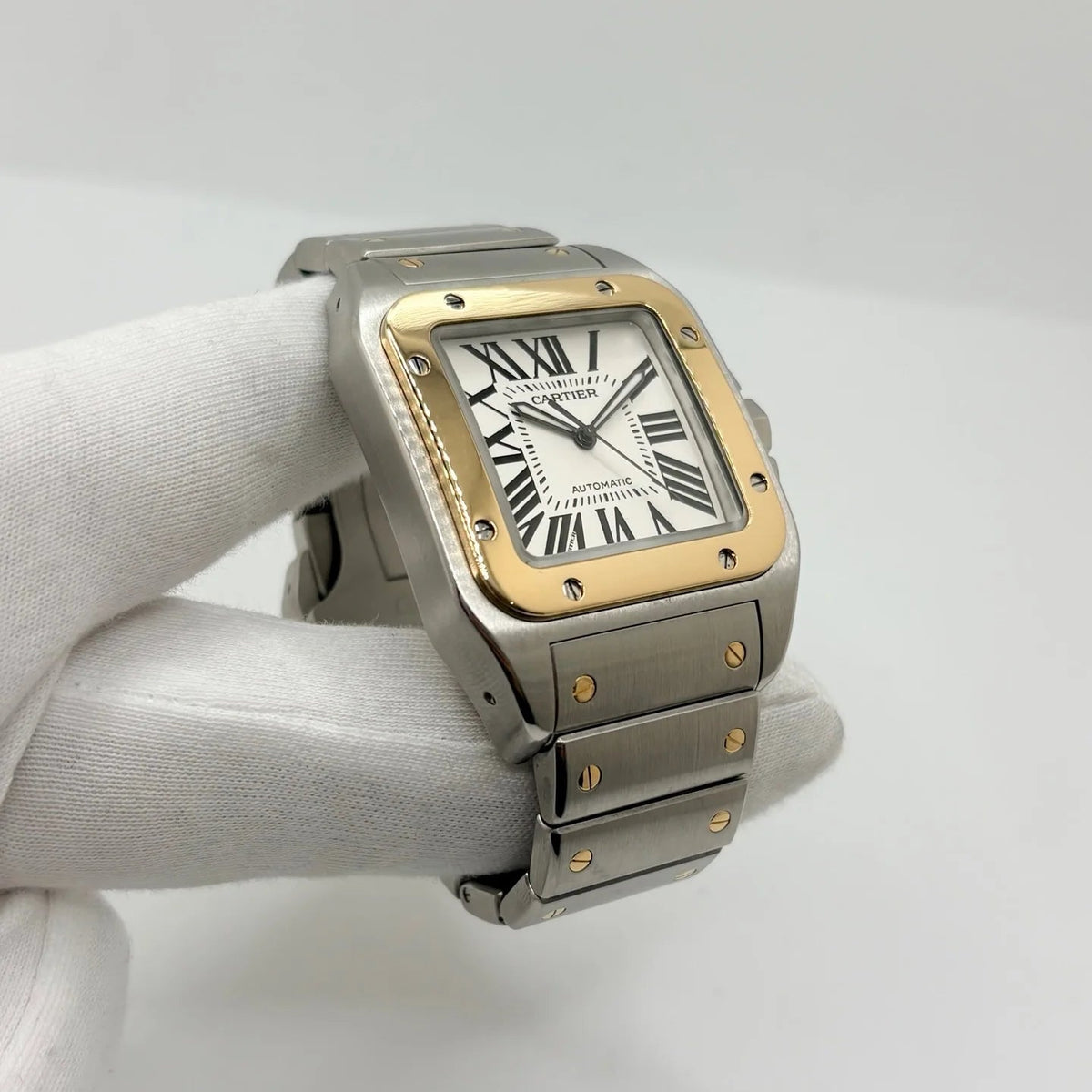 CARTIER "Santos 100" watch in yellow gold and stainless steel