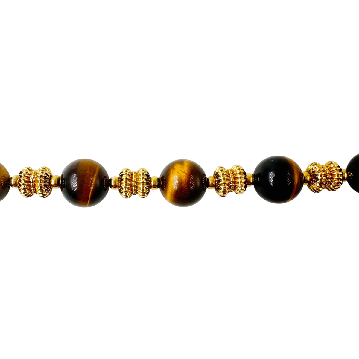 Bracelet O.J. PERRIN en or jaune et perles d'oeil de tigre