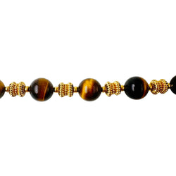 Bracelet O.J. PERRIN en or jaune et perles d'oeil de tigre