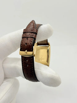 JAEGER-LECOULTRE "Tank Vintage" Watch in yellow gold, stainless steel, and leather