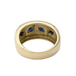 Band Ring in white gold, yellow gold, sapphires, and diamonds