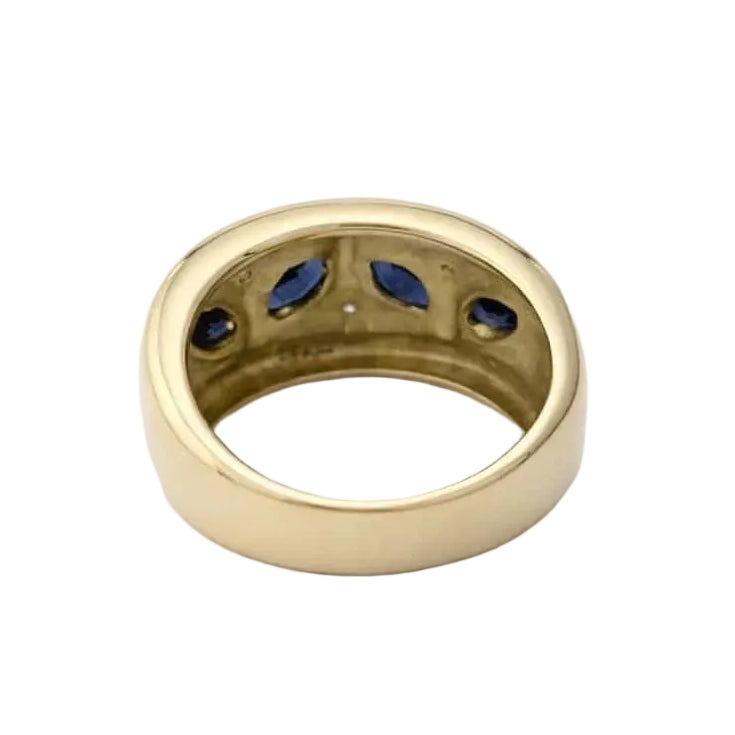 Band Ring in white gold, yellow gold, sapphires, and diamonds
