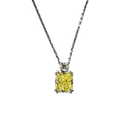 White Gold Necklace with a Pendant Featuring a Fancy Yellow Diamond and a Diamond