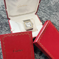 CARTIER "Santos 100" watch in yellow gold and stainless steel