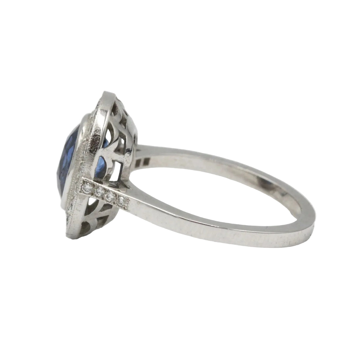 Entourage Ring in Platinum, Sapphire, and Diamonds