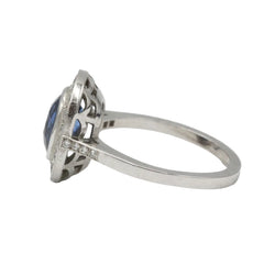 Entourage Ring in Platinum, Sapphire, and Diamonds