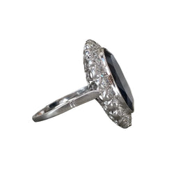 Entourage Ring in white gold, sapphire, and diamonds