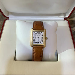 CARTIER "Tank Solo" watch in yellow gold, stainless steel, and leather