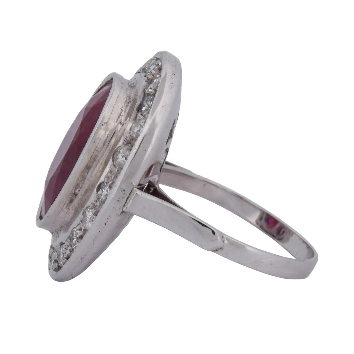 Entourage Ring in white gold, rubies, and diamonds
