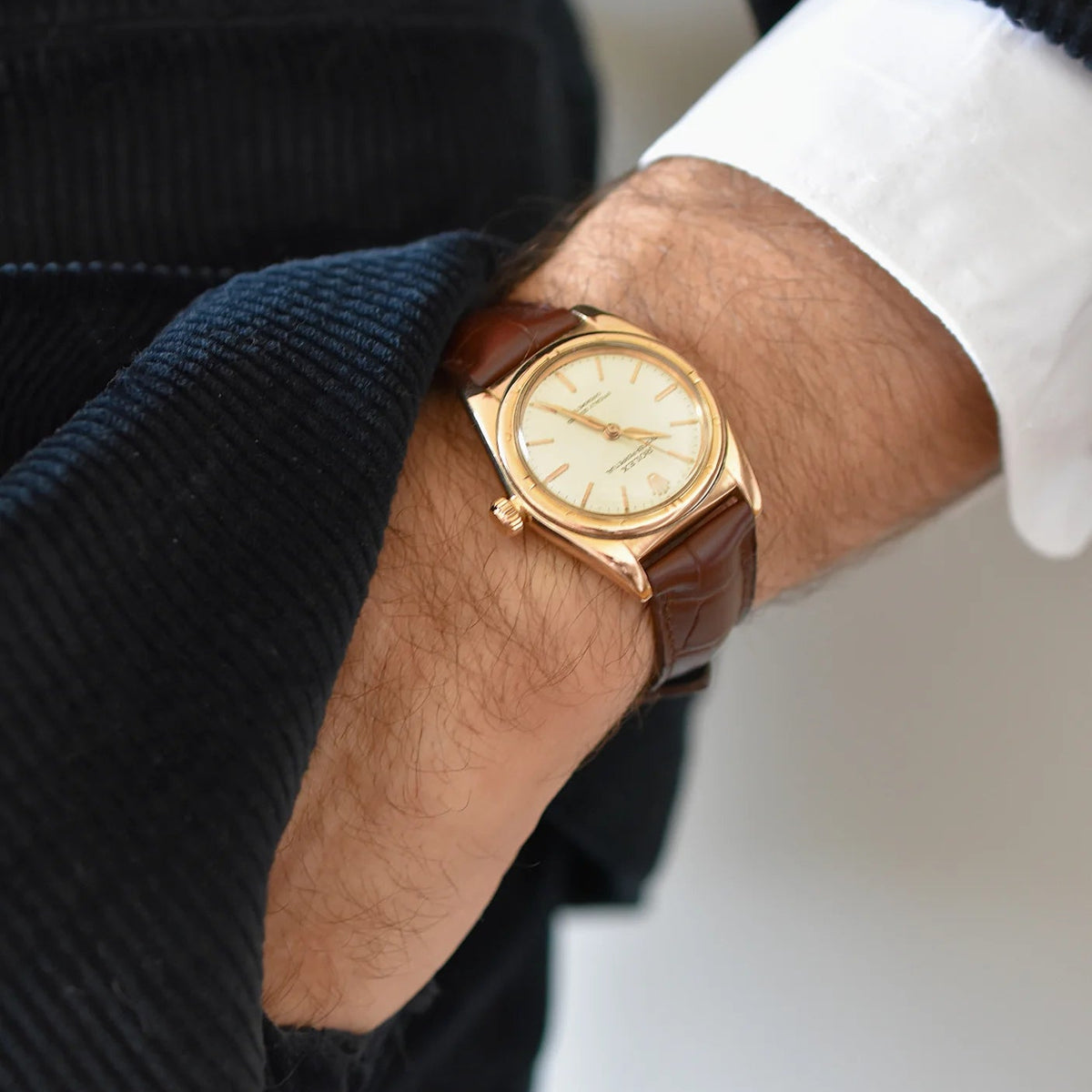 ROLEX "Perpetual Ovetto Bubbleback" watch in rose gold and leather
