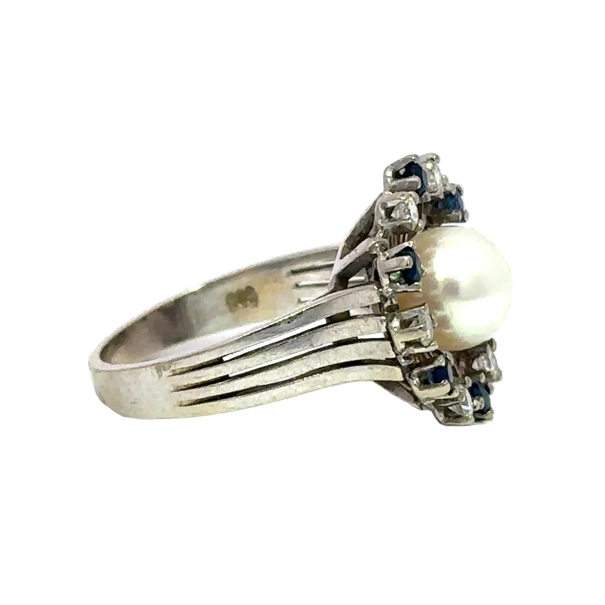 Bague Marguerite en or, perle, saphirs et diamants
