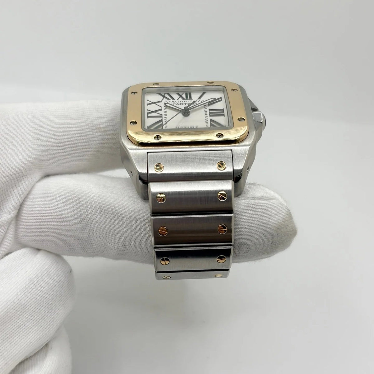 Montre CARTIER Santos 100 en or jaune et acier inoxydable