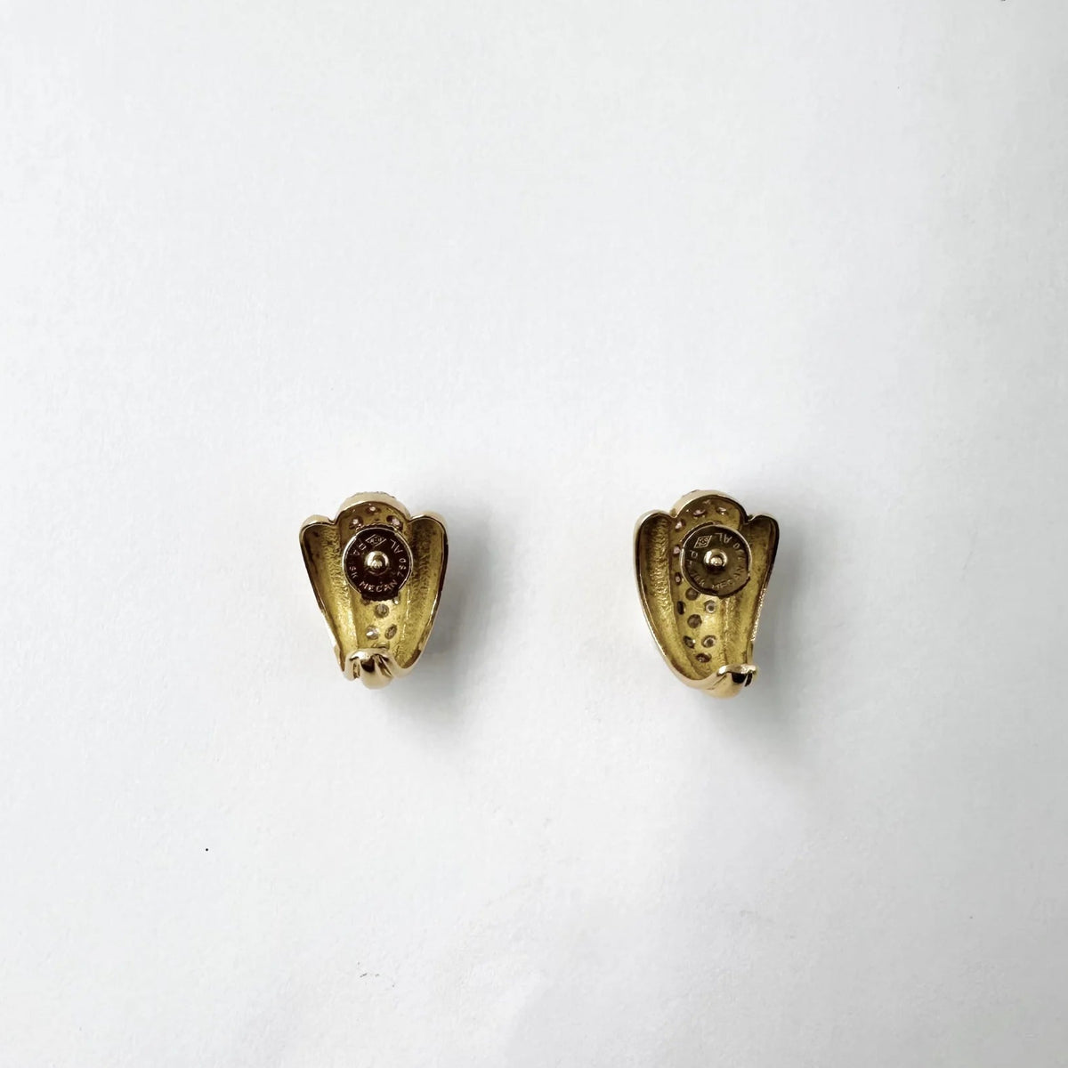 Earrings in white gold, yellow gold, and diamonds