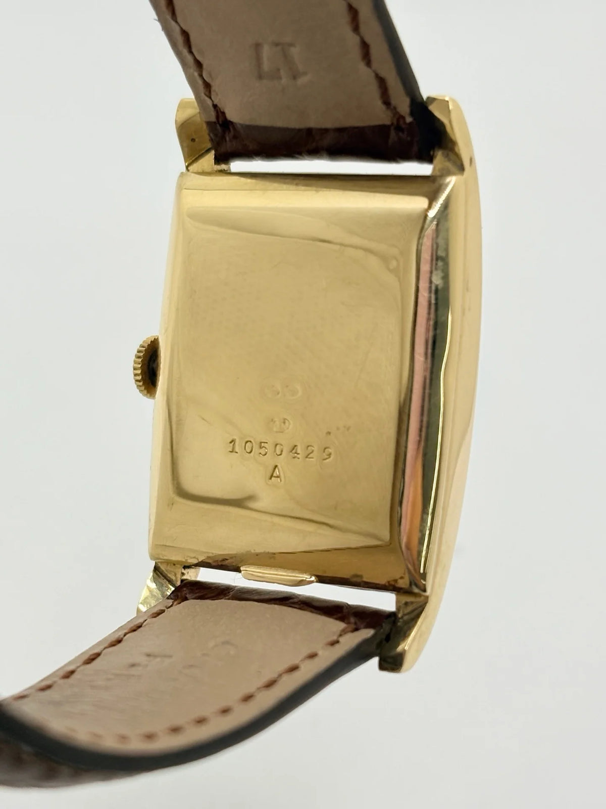 JAEGER-LECOULTRE "Tank Vintage" Watch in yellow gold, stainless steel, and leather
