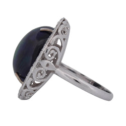 Entourage Ring in white gold, Opal, and Diamonds