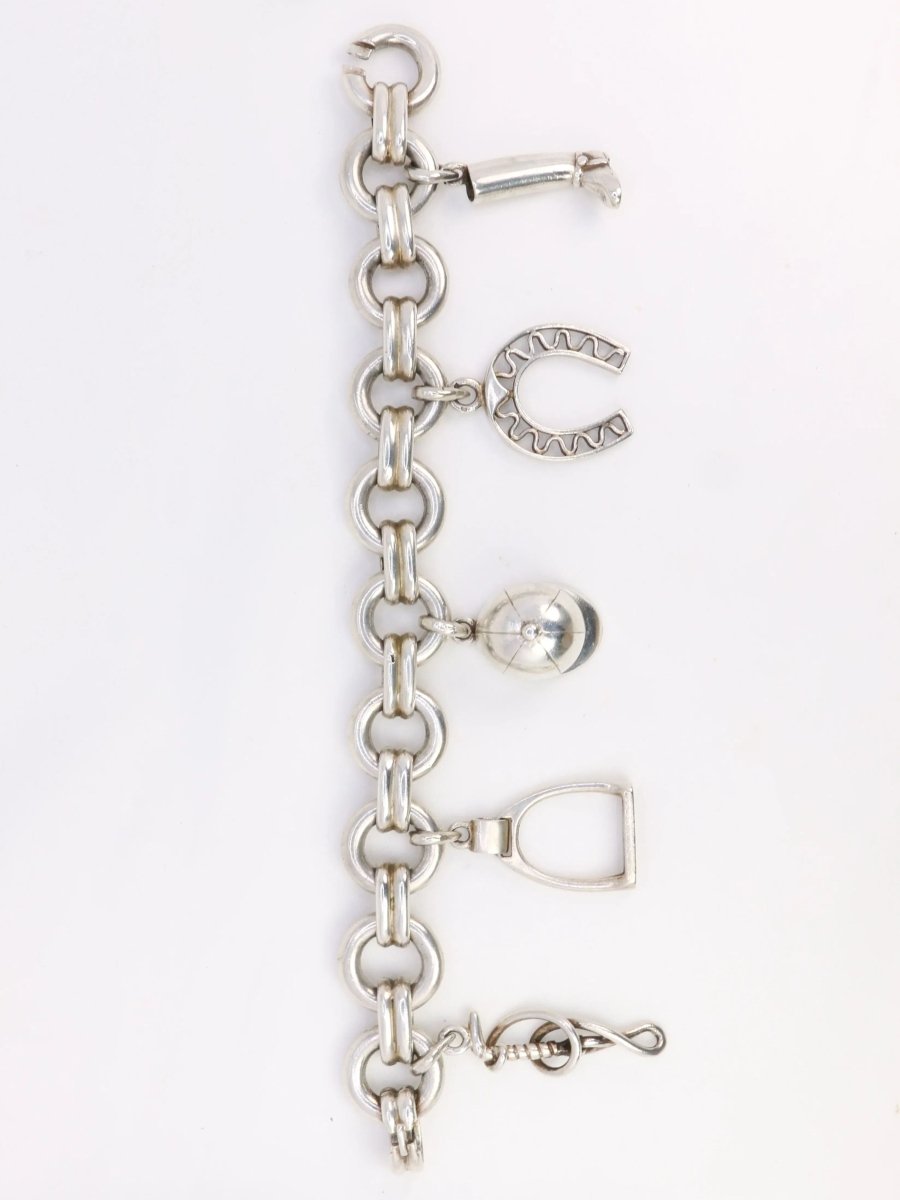 Gaétan de Percin (attribué à HERMES) Bracelet en argent et breloques thème hippique - Castafiore
