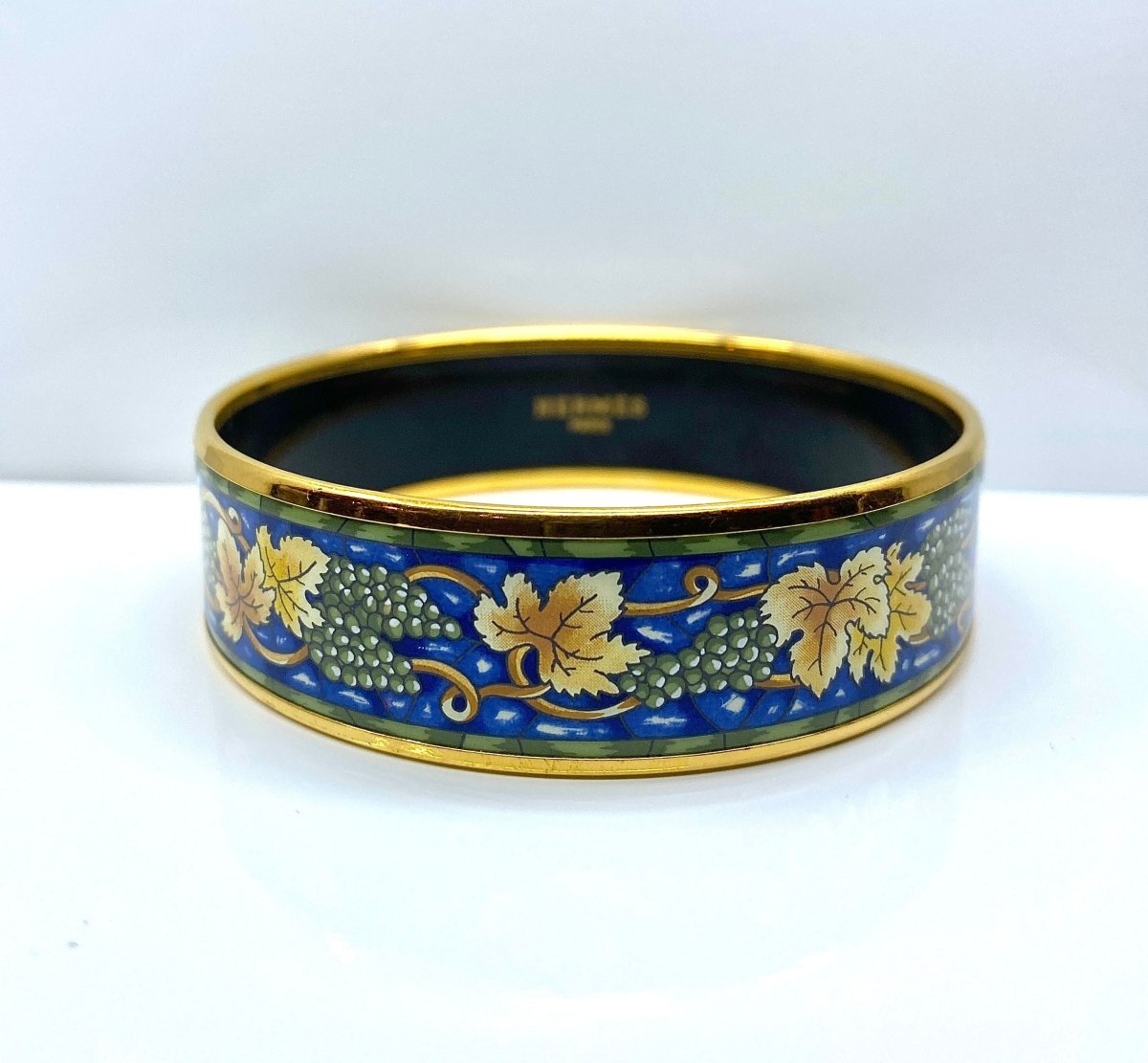 HERMÈS bracelet en métal doré et émail. - Castafiore