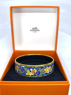 HERMÈS bracelet en métal doré et émail. - Castafiore
