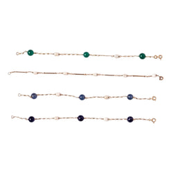 Lot de quatre bracelets en or jaune et perles - Castafiore