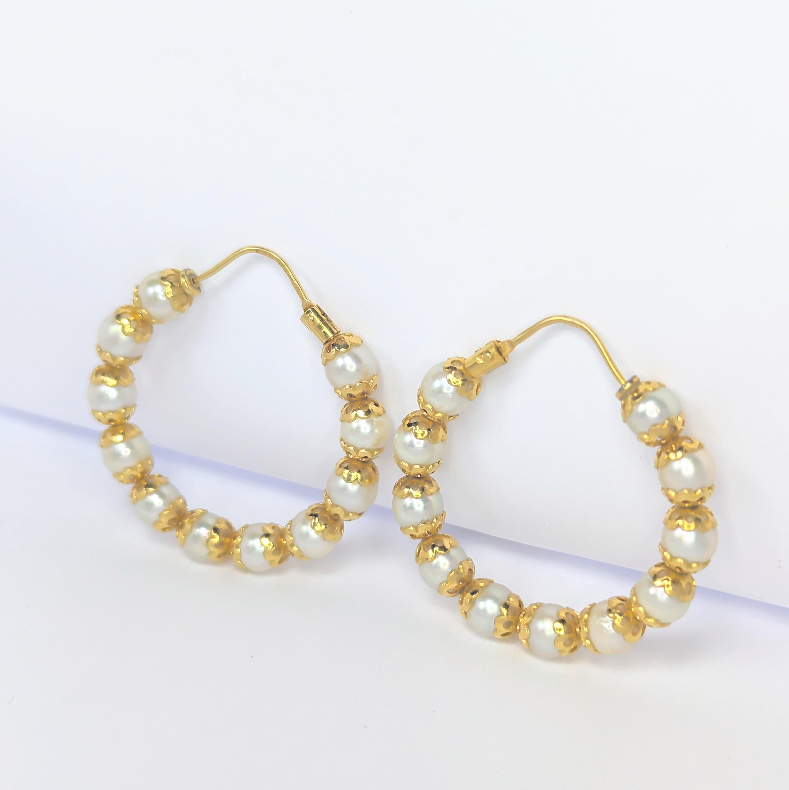 Boucles d'oreilles en or jaune et Perles