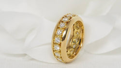 American wedding ring in yellow gold and diamonds