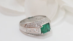 Emerald and diamond white gold bangle ring 