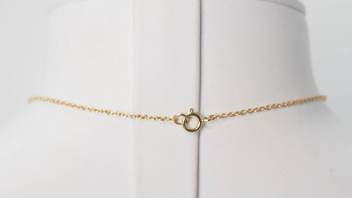 Yellow gold, emerald and diamond pendant necklace 