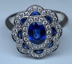 Bague marguerite en or 18 carats en saphirs et diamants