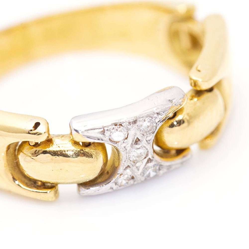 Articulated ring in two-tone gold and diamonds. Second hand