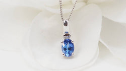 Collier en or blanc, tanzanite et diamants