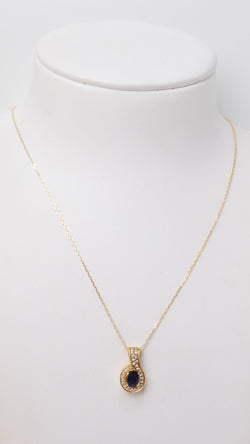 Pendant and chain in yellow gold, sapphire and diamonds 