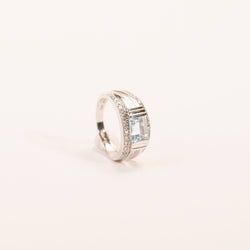 Emerald-cut topaz and diamond band ring in white gold