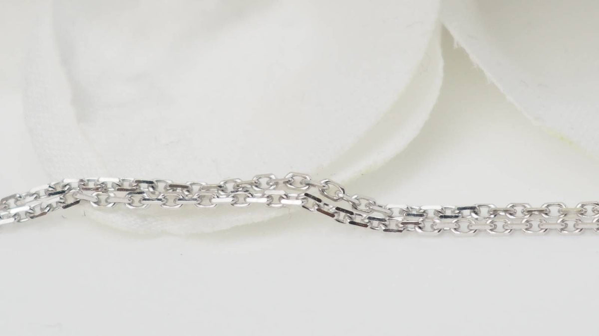 White gold, emerald and diamond pendant necklace 