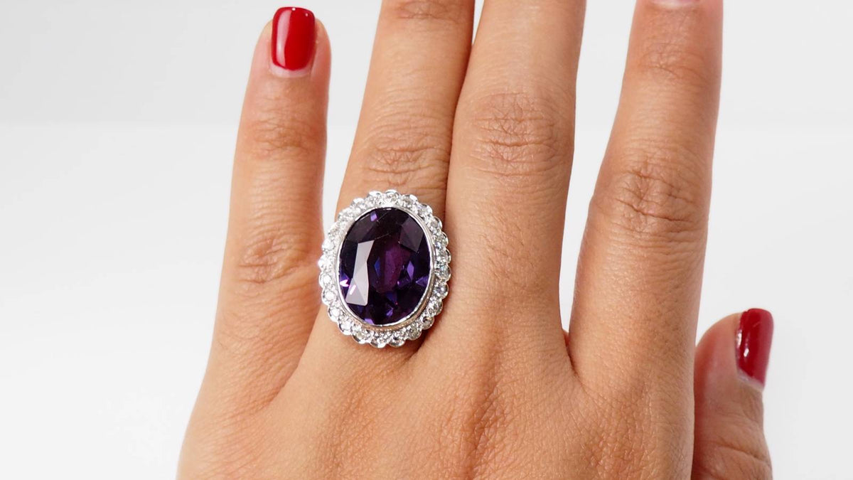 White gold and platinum ring, purple corundum and diamonds 
