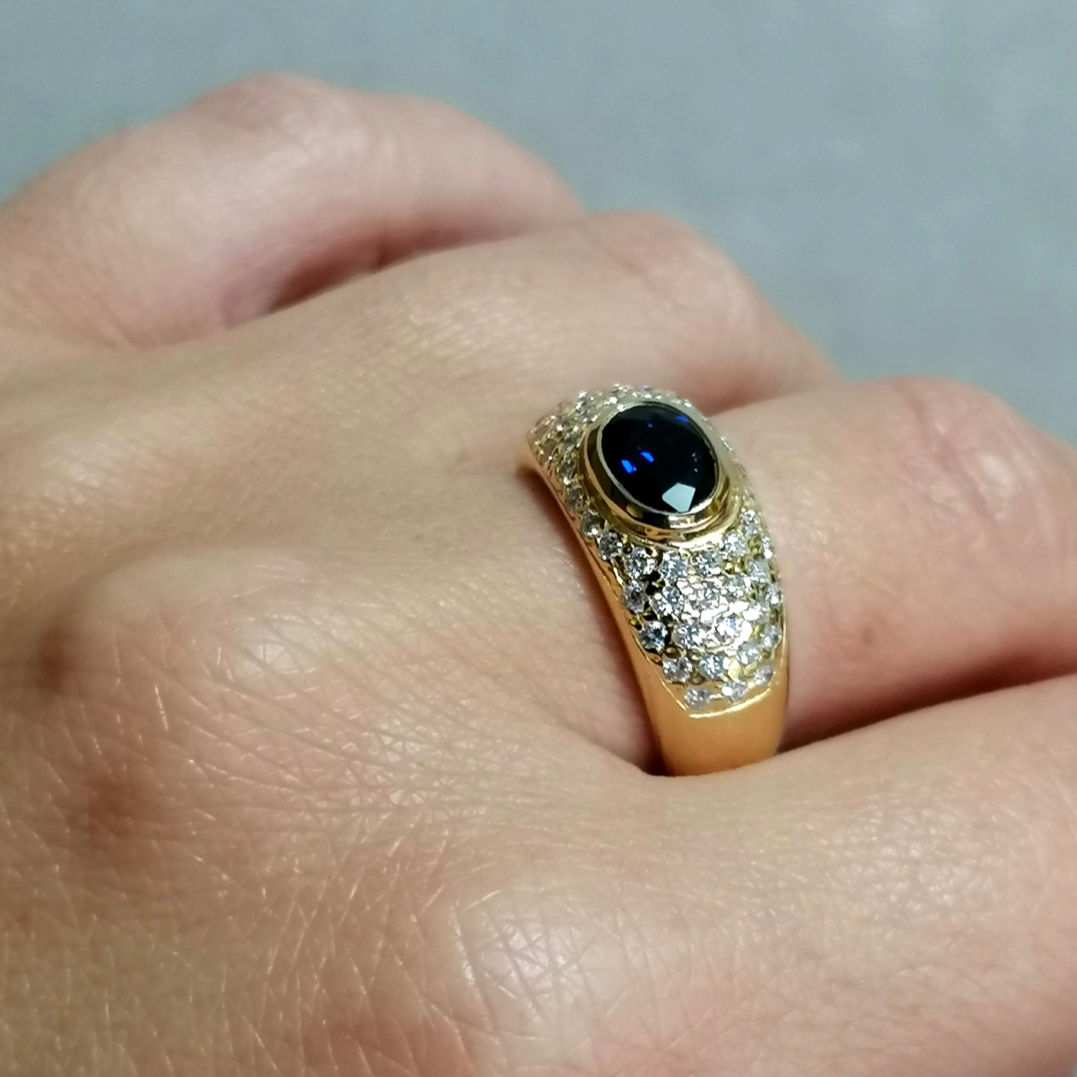 Yellow gold sapphire and diamond ring 