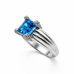 Ring Solitaire in paltinium and topaz